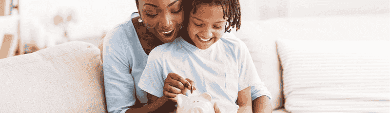 woman and child siting on couch