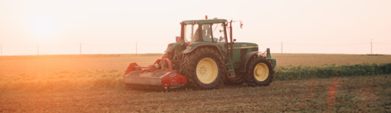 tractor mowing grass