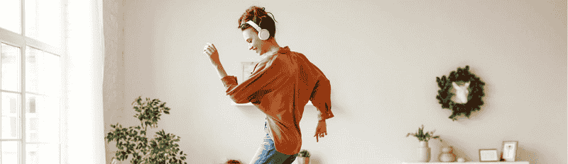 lady dancing with headphones