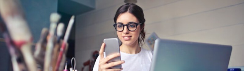 lady on phone and computer