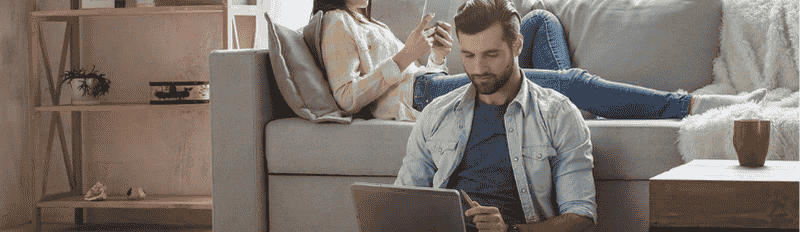 man and woman on devices